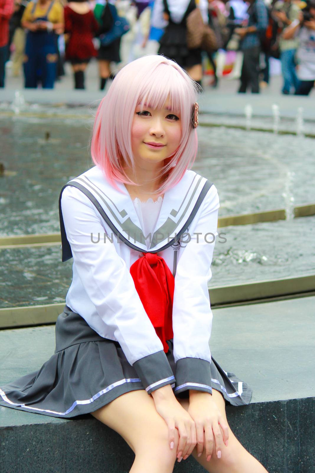 Bangkok - Aug 31: An unidentified Japanese anime cosplay pose  on August 31, 2014 at Central World, Bangkok, Thailand.