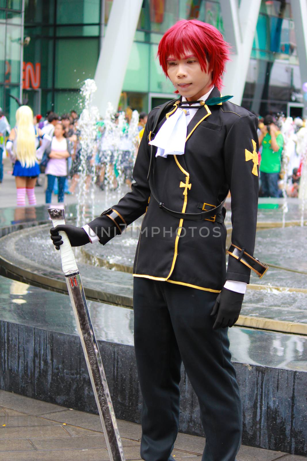 Bangkok - Aug 31: An unidentified Japanese anime cosplay pose  on August 31, 2014 at Central World, Bangkok, Thailand.