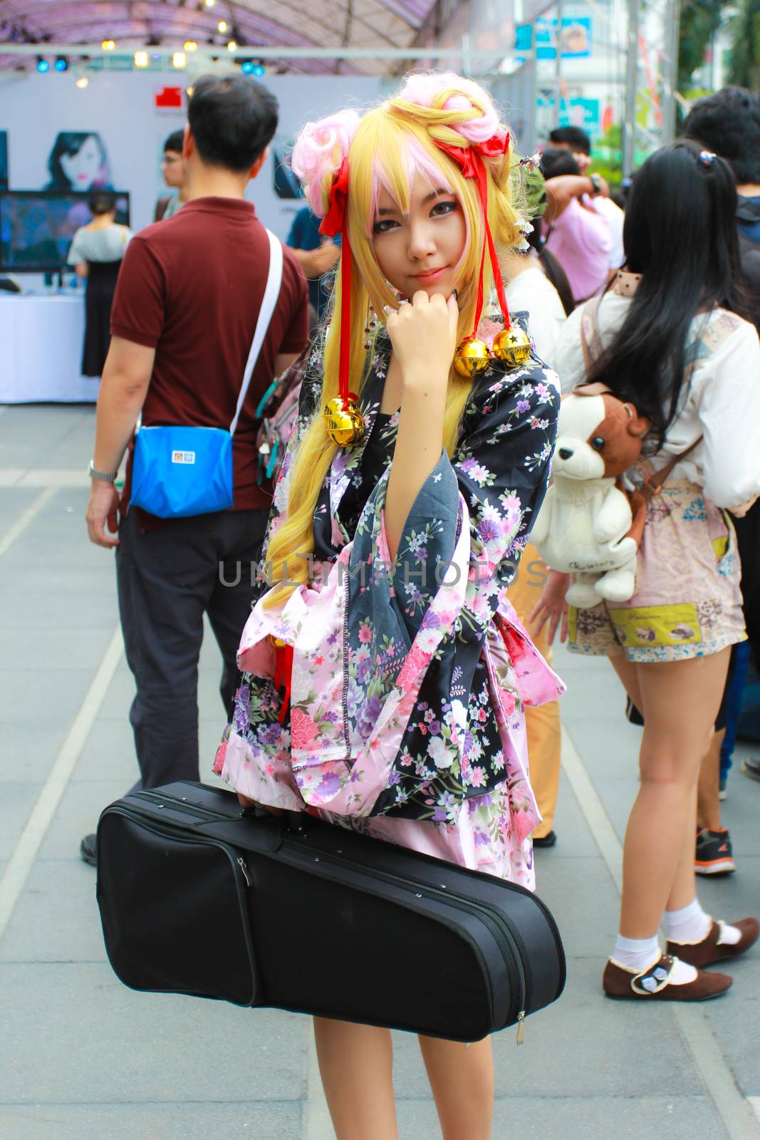 Bangkok - Aug 31: An unidentified Japanese anime cosplay pose  on August 31, 2014 at Central World, Bangkok, Thailand.