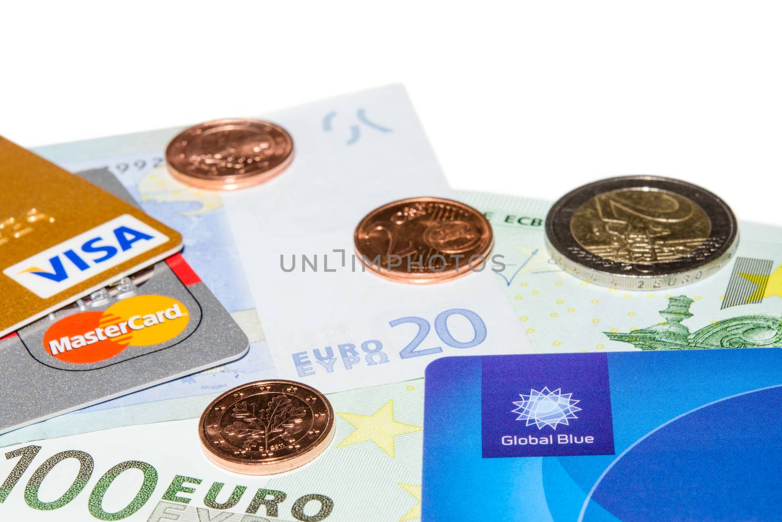 Credit and Tax Free cards on Euro banknotes with coins by servickuz