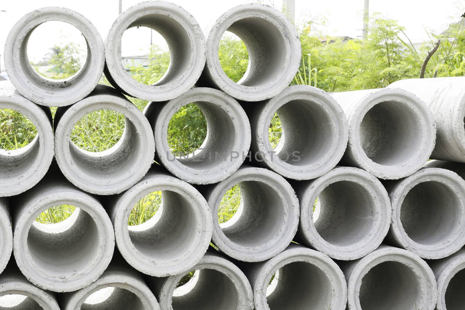pile of concrete Drainage Pipe on a Construction Site