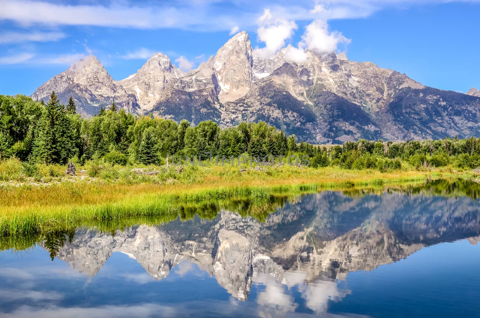 Grand Teton mountains landscape view with water reflection, USA by martinm303