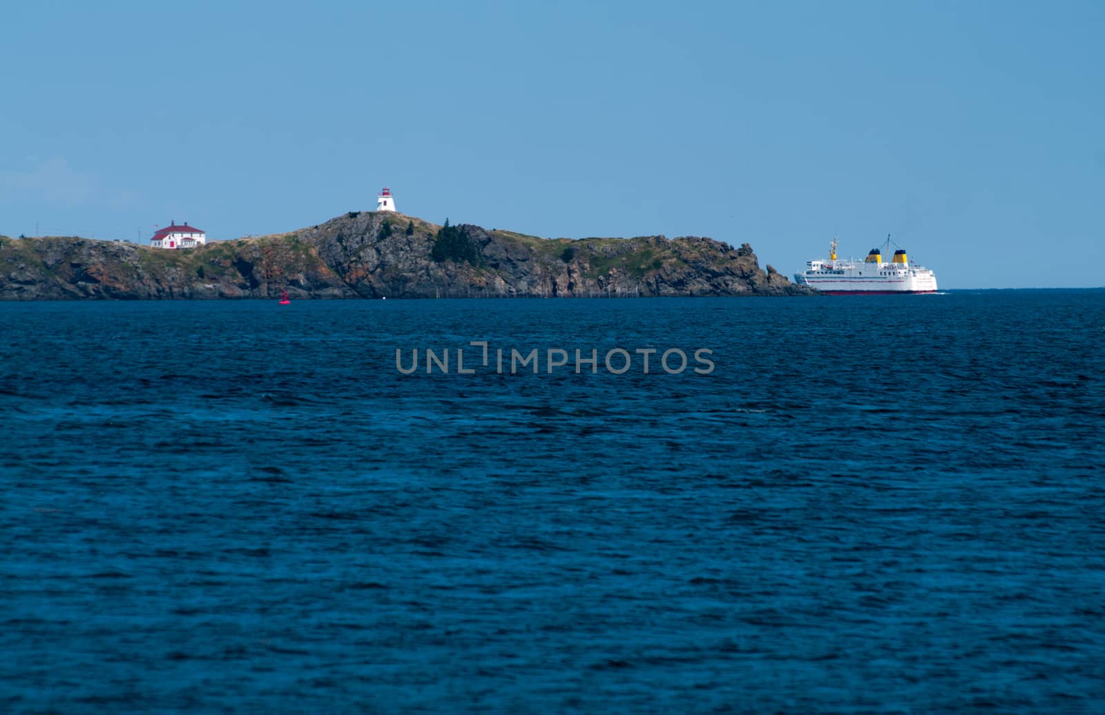 Ferry departing around Lighthouse 