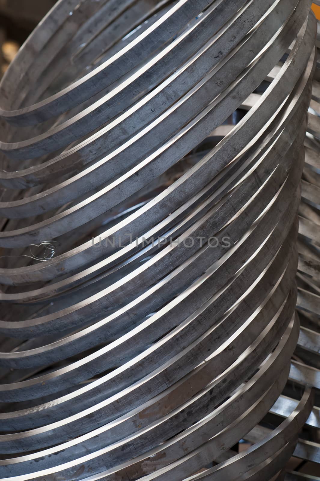 Rings of stainless steel at an industrial workshop.