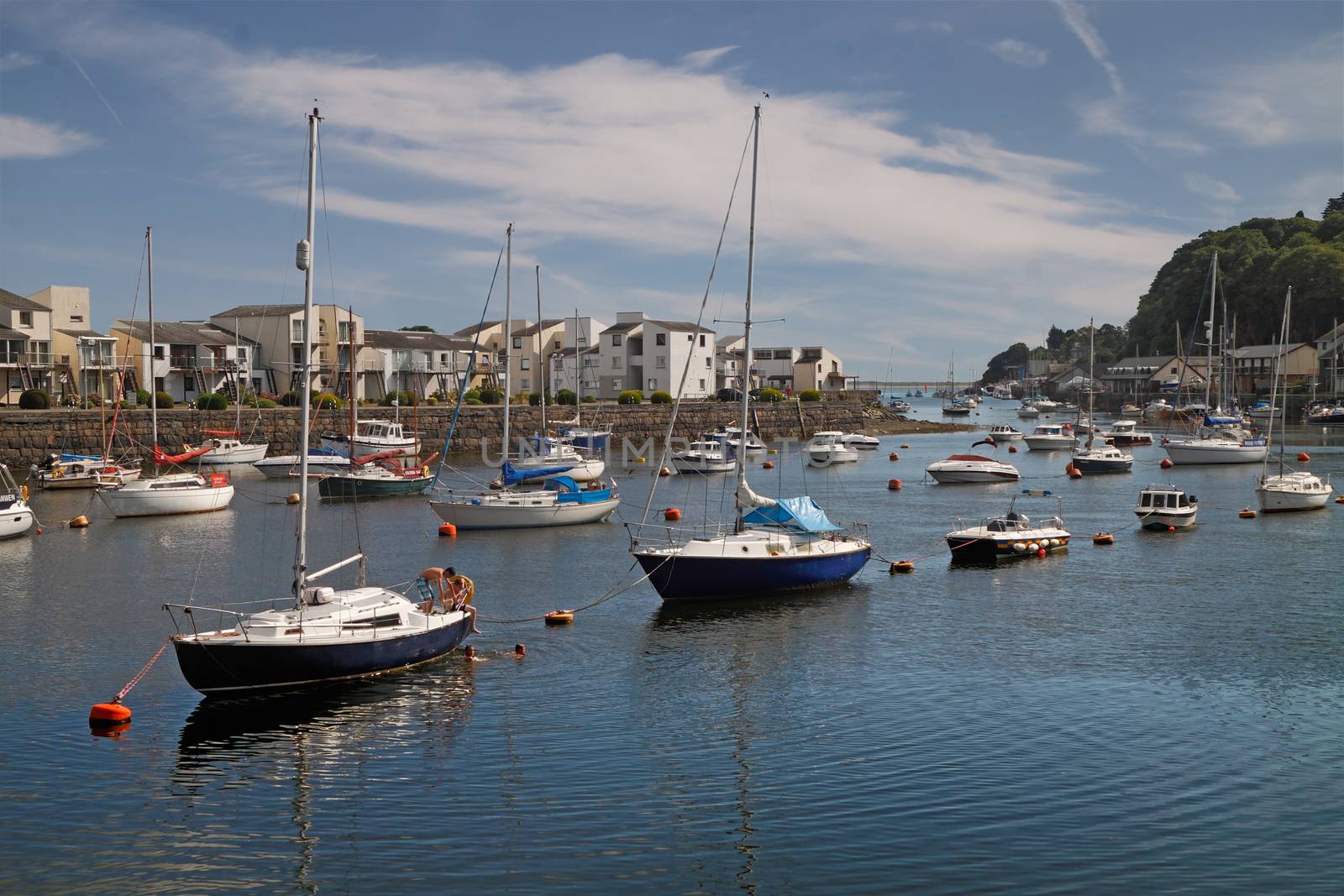 Porthmadog harbour in Wales, UK, is used mainly by pleasure boats and has many harbourside dwellings.