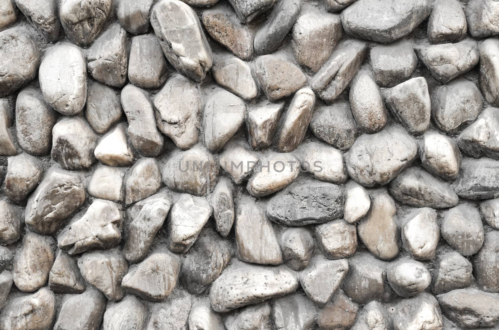 Stone wall. Texture of different forms stones similar to wall. by nopparats