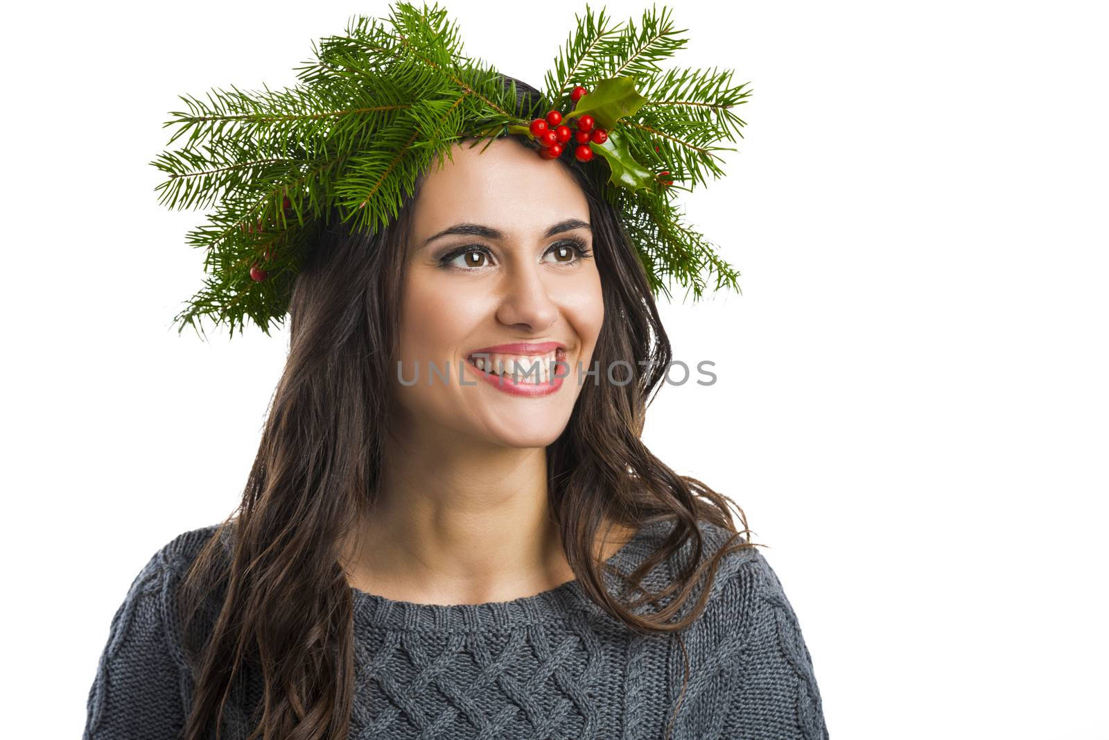 Portrait of a beautiful woman with Cristmas decorations on the head
