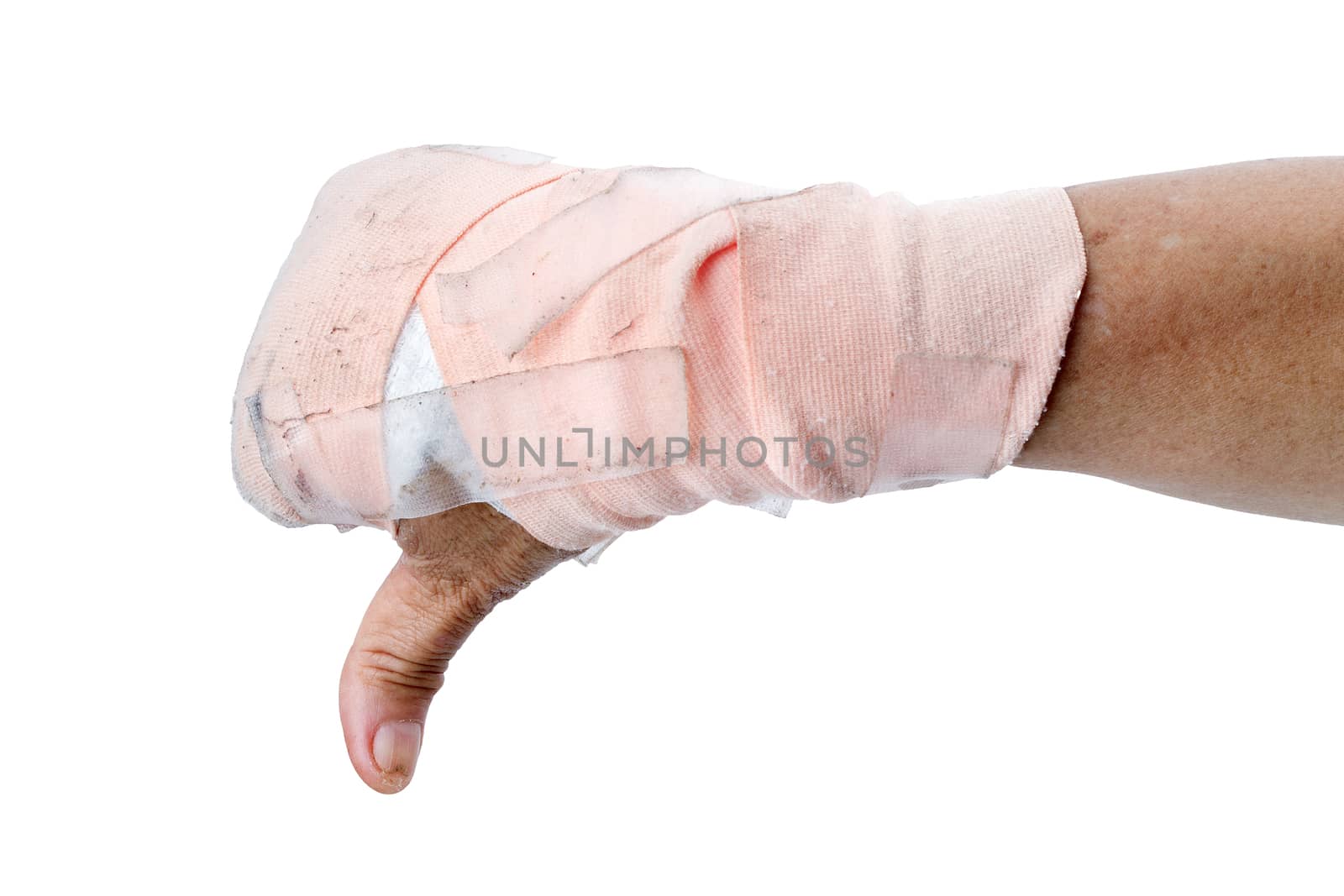 Thumb down showing by hand with bandages isolated on white background