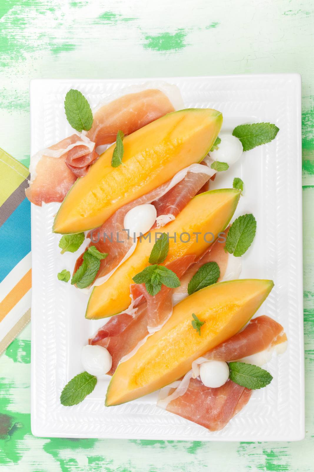 Melon slices with prosciutto and mozzarella by Slast20