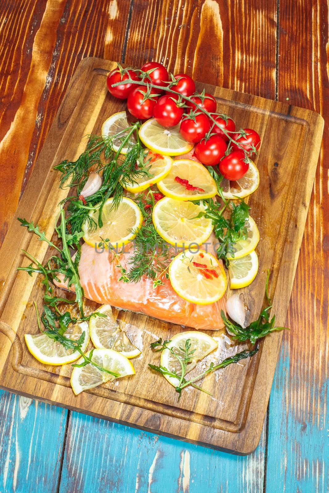 Olive Oil Poached Salmon and herbs, ready to cook