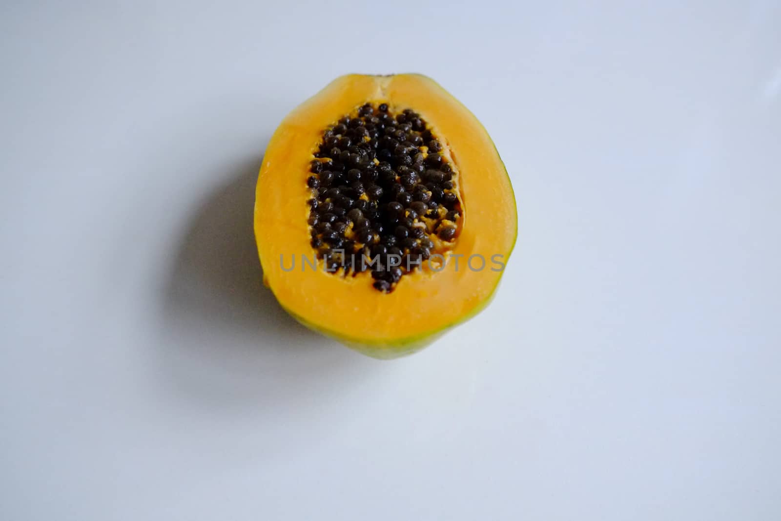 Large papaya cut in half