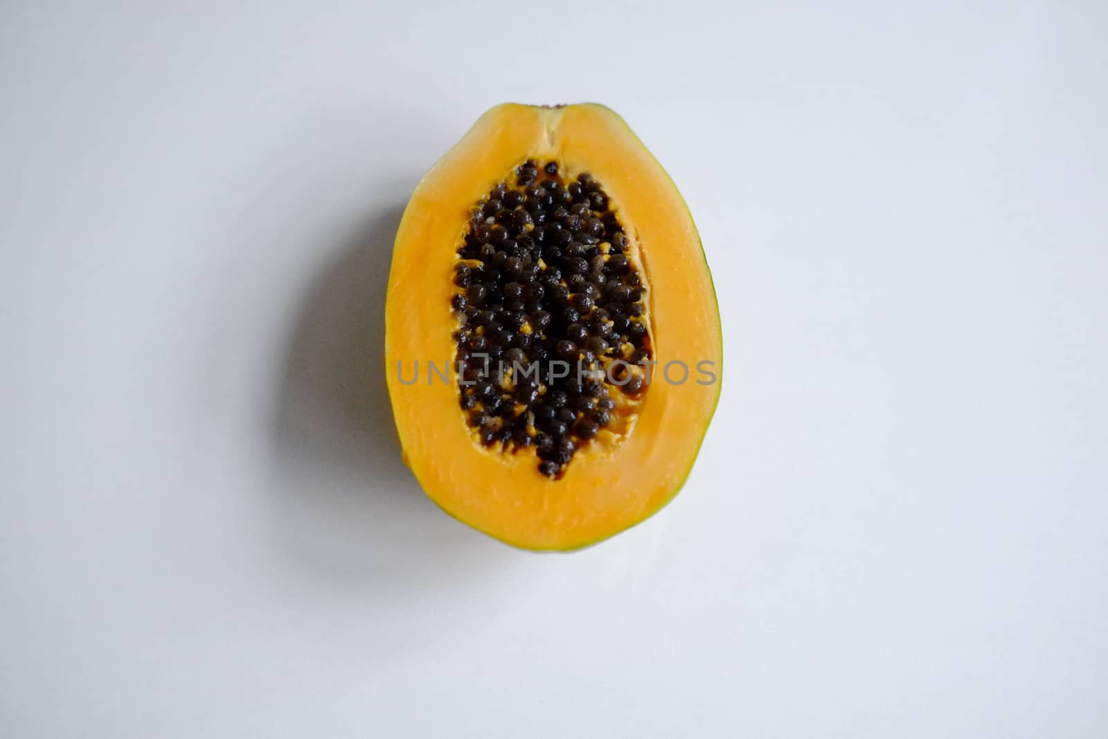 Large papaya cut in half