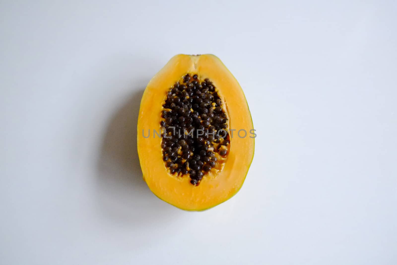 Large papaya cut in half