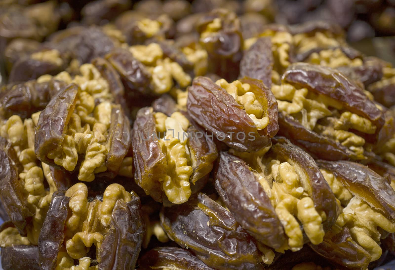 Dates stuffed with walnuts by photosil