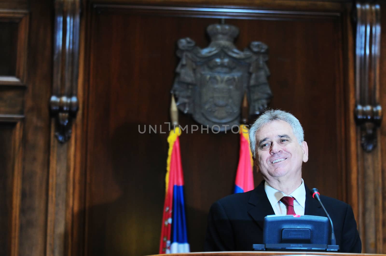 SERBIA, BELGRADE - MAY 31, 2012: President of Serbia Tomislav Nikolich speaks in Serbian Parliament high in the air on his inauguration day