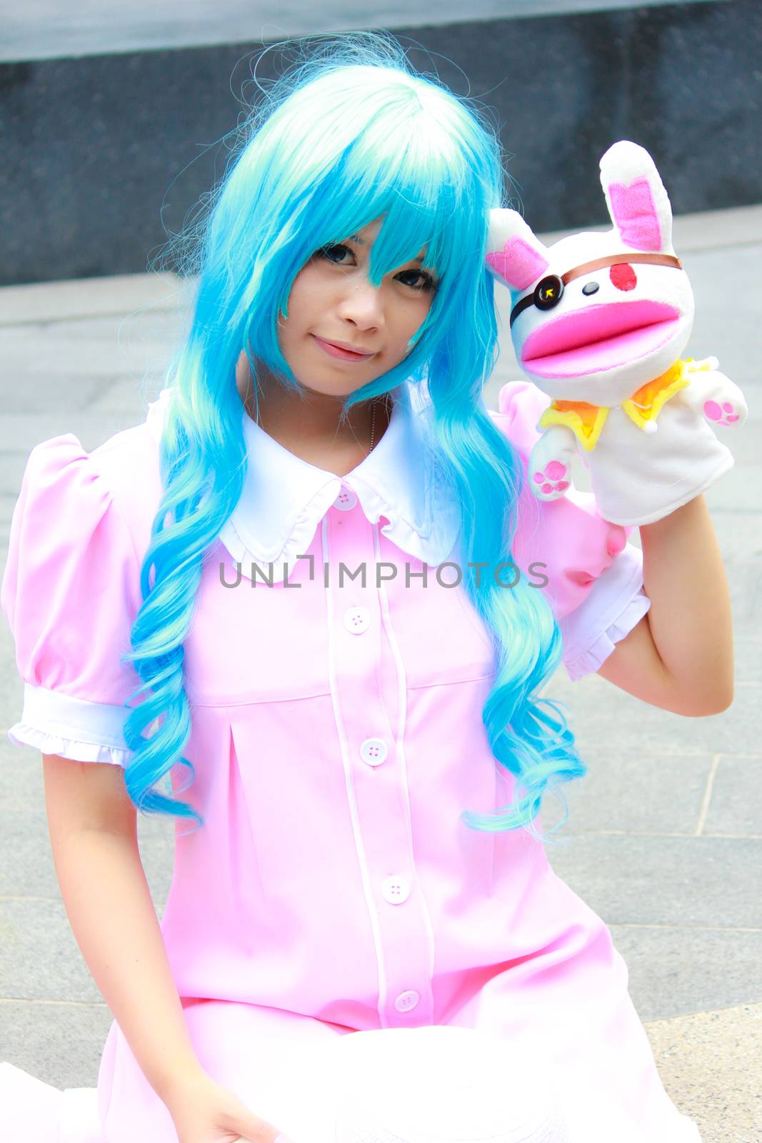 Bangkok - Aug 31: An unidentified Japanese anime cosplay pose  on August 31, 2014 at Central World, Bangkok, Thailand.