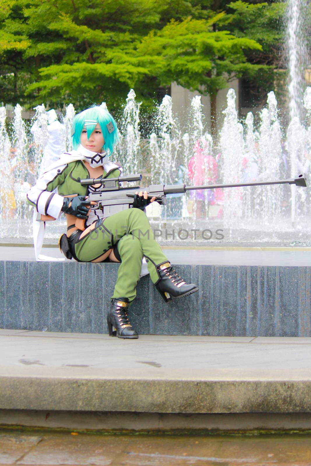 Bangkok - Aug 31: An unidentified Japanese anime cosplay Sinon pose  on August 31, 2014 at Central World, Bangkok, Thailand.