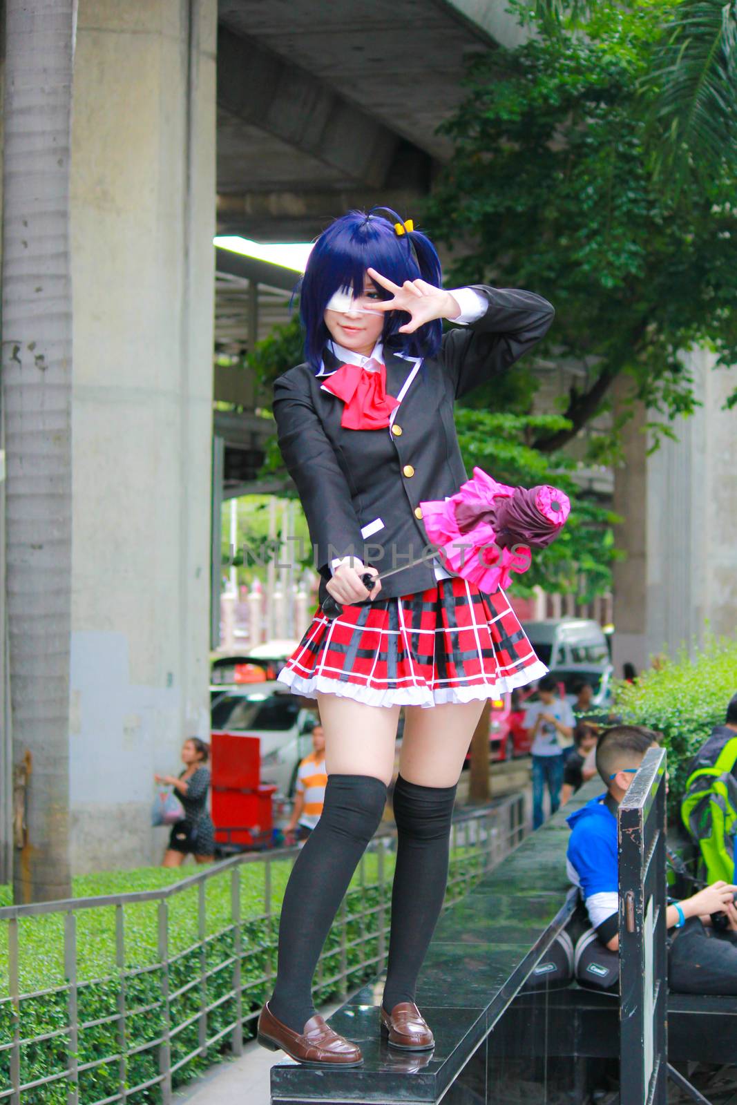 Bangkok - Aug 31: An unidentified Japanese anime cosplay Takanashi Rikka pose  on August 31, 2014 at Central World, Bangkok, Thailand.