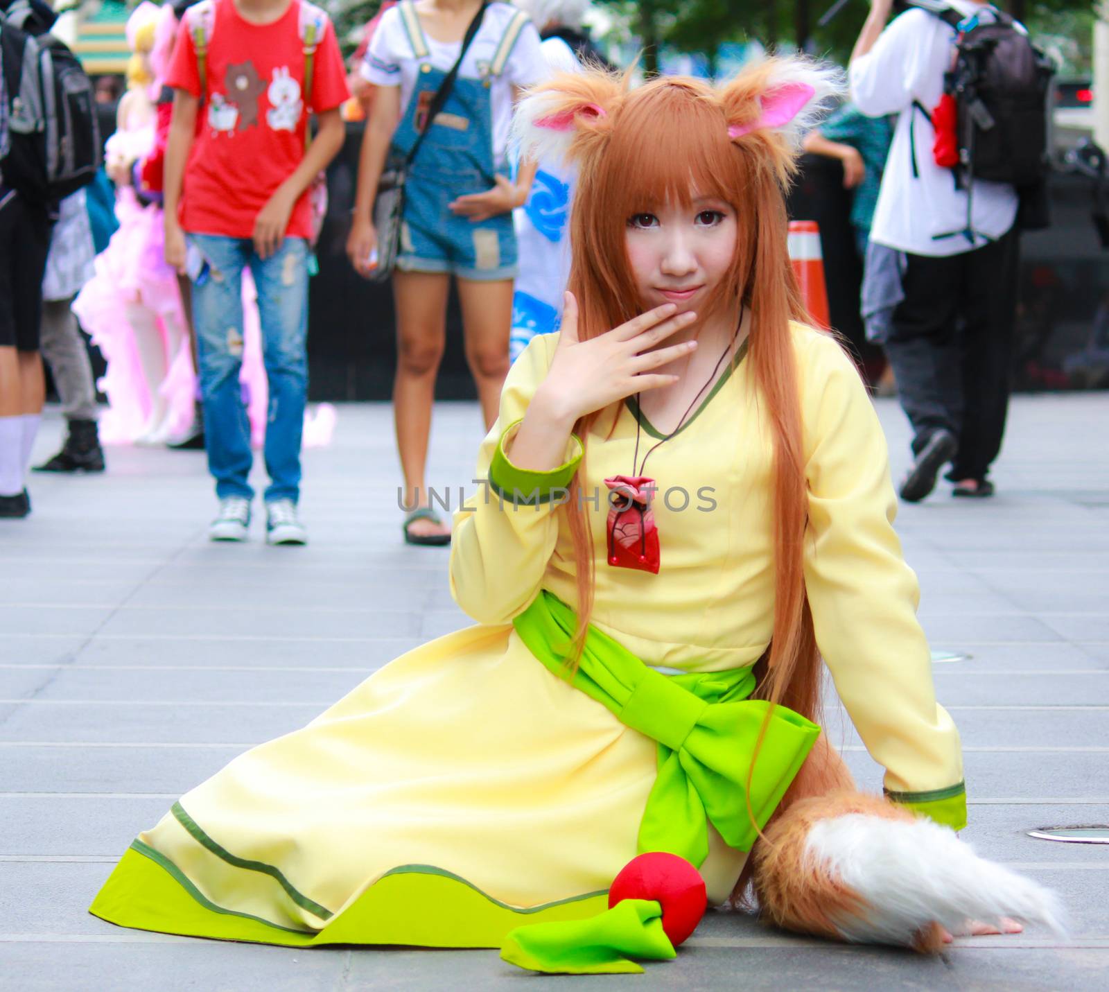 Bangkok - Aug 31: An unidentified Japanese anime cosplay pose  on August 31, 2014 at Central World, Bangkok, Thailand.