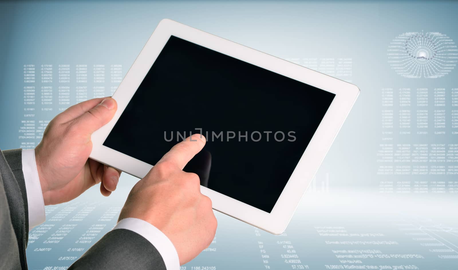 Two hands using tablet pc on hi-tech background