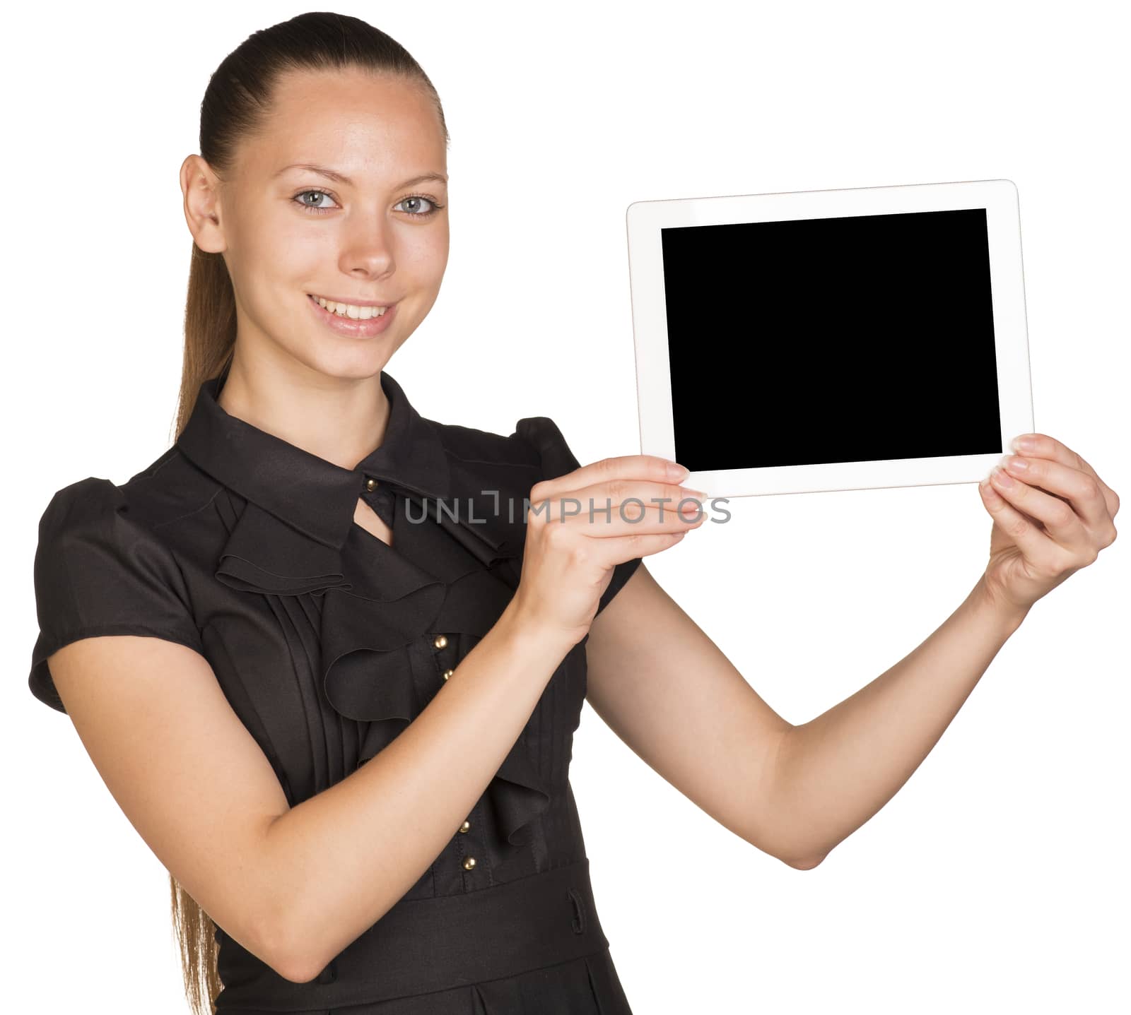 Beautiful girl in dress holding tablet and looking at camera. Isolated on white background