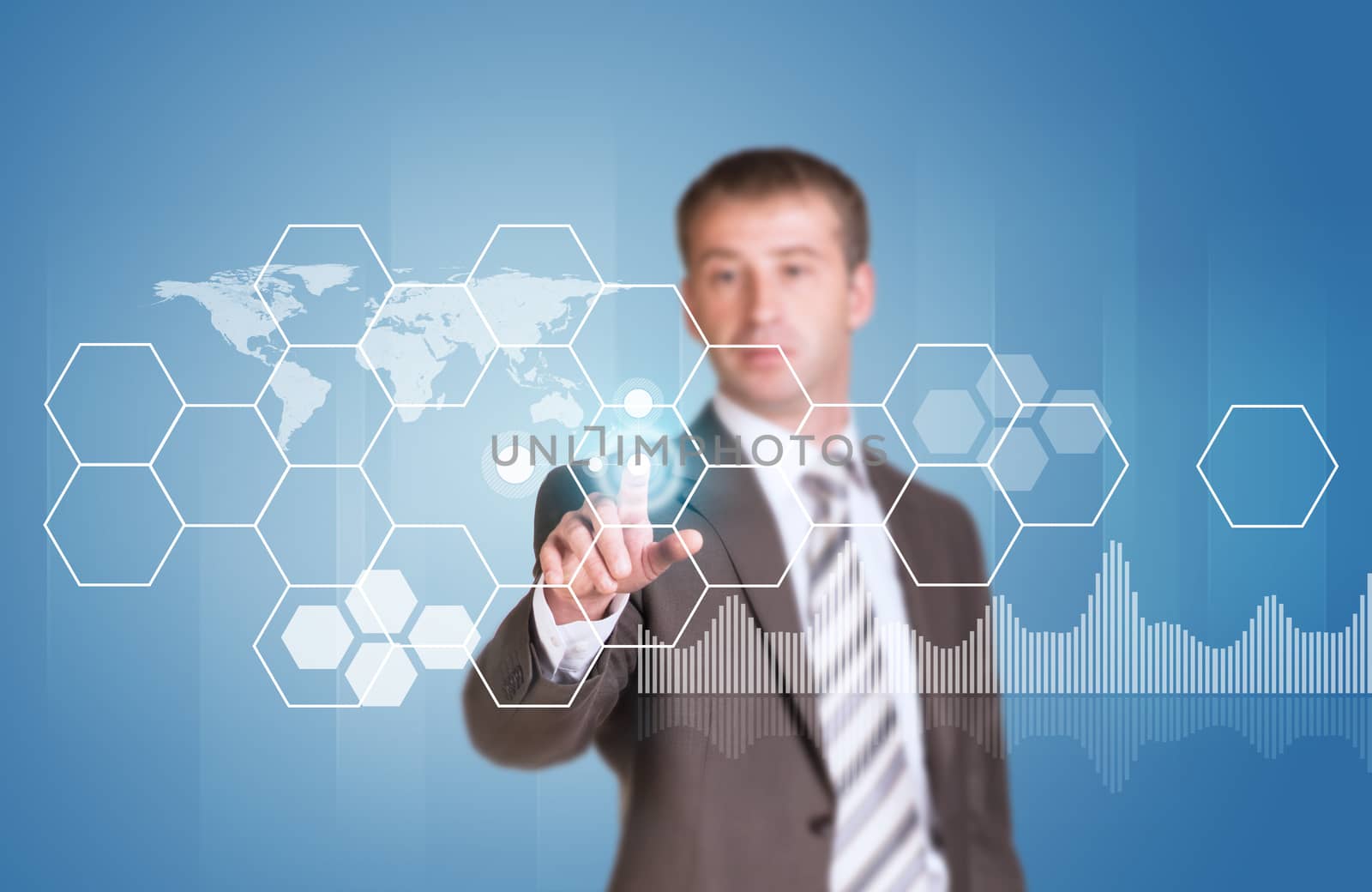 Businessman in suit finger presses virtual button. Transparent hexagons and world map as backdrop