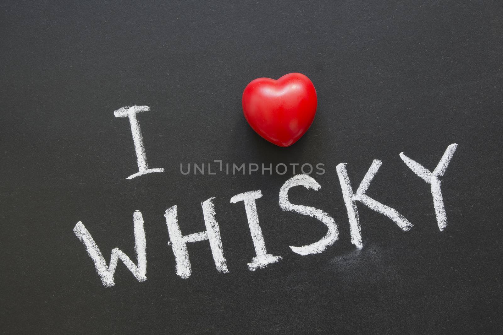 I love whisky phrase handwritten on blackboard