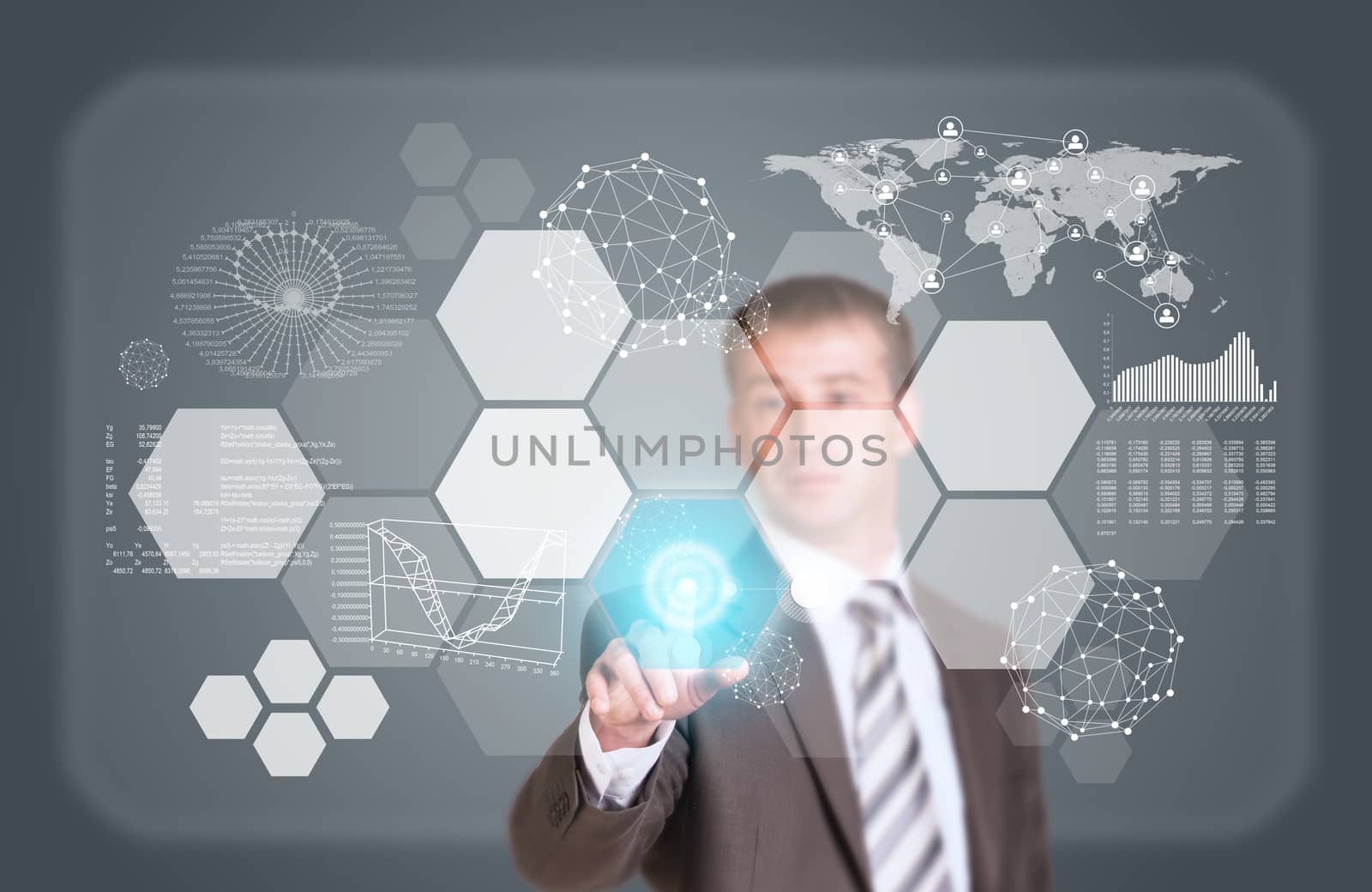 Businessman in suit finger presses virtual button. Graphs, world map, network and other elements as backdrop