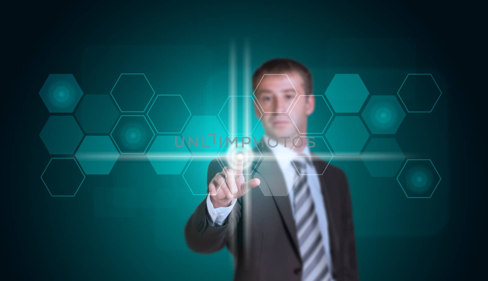 Businessman in suit finger presses virtual button. Transparent hexagons and glow circles as backdrop