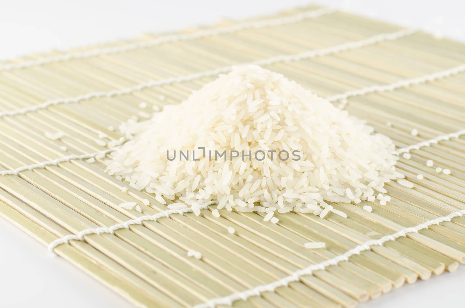 uncook rice on wooden pad