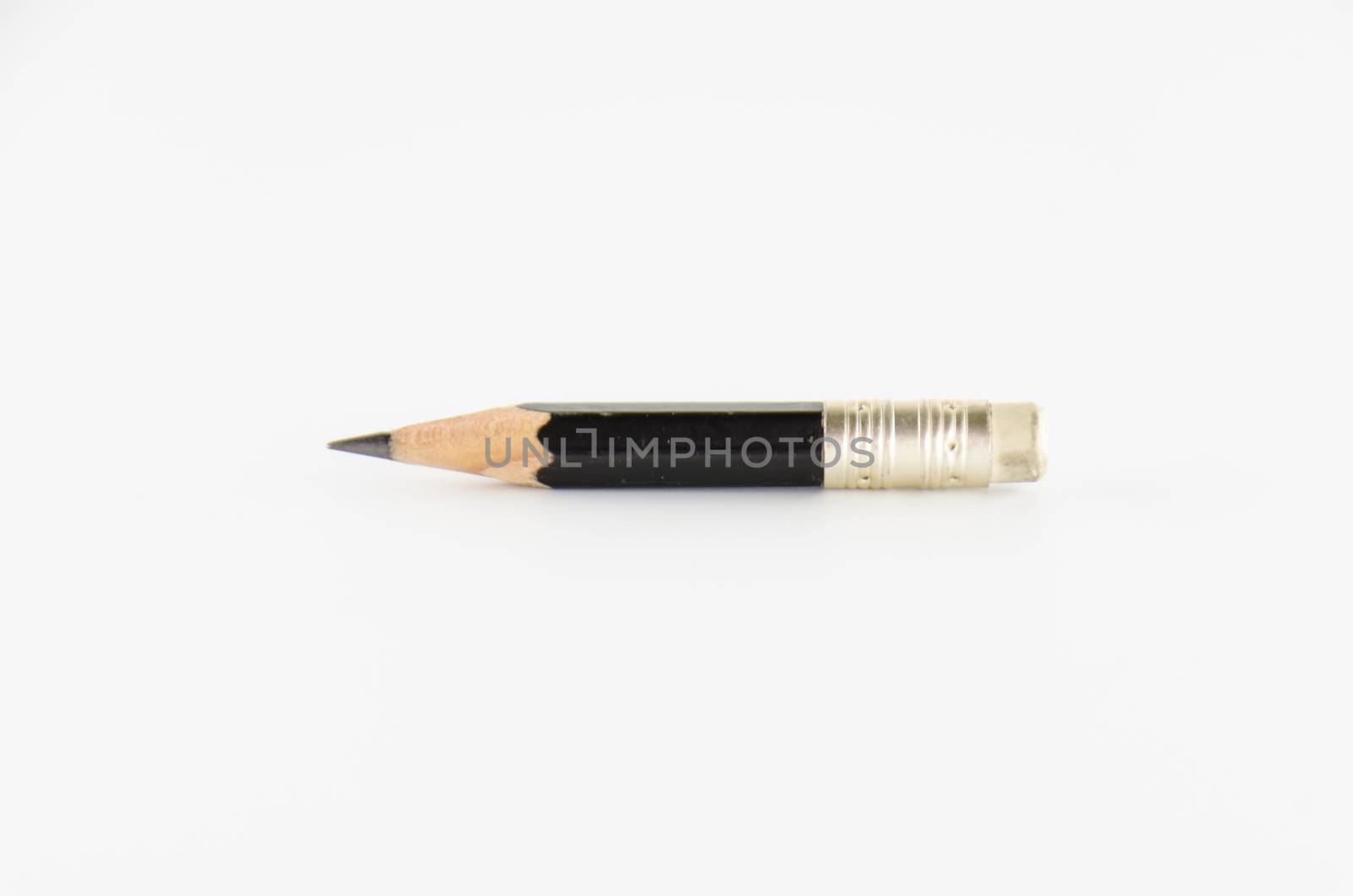short black pencil on a white background