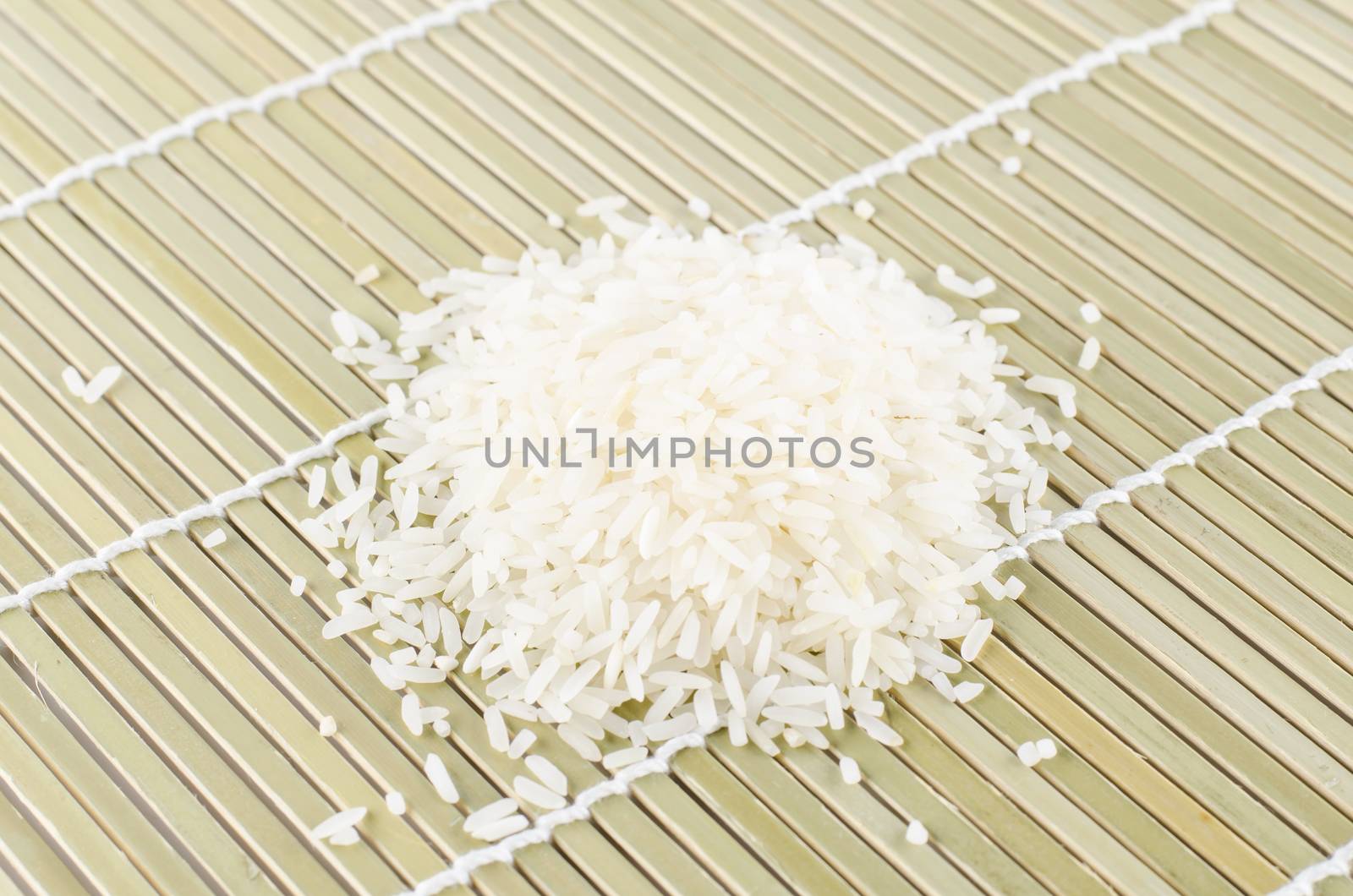 uncook rice on wooden pad