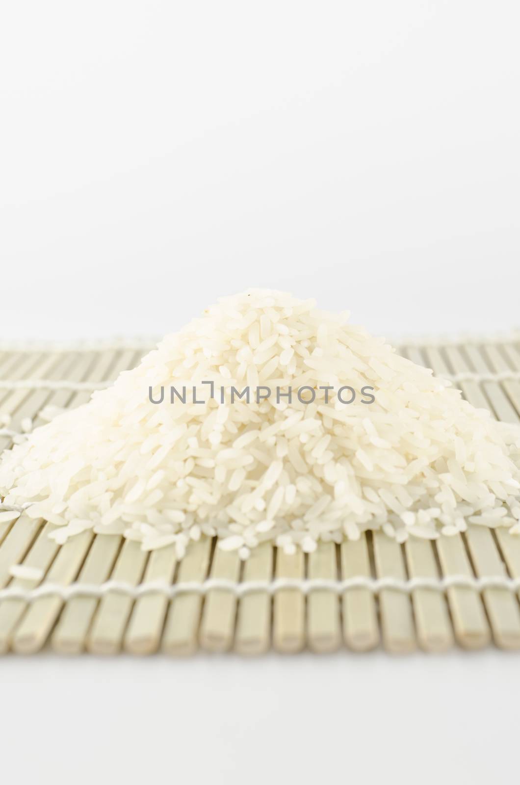 uncook rice on wooden pad