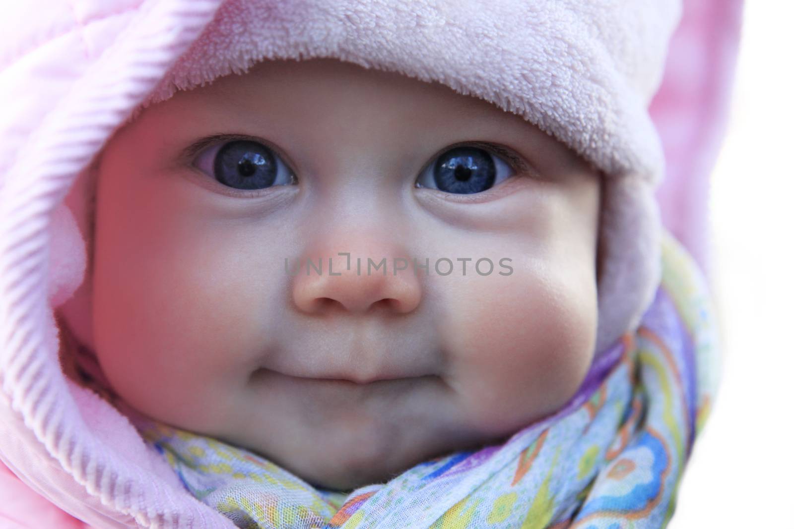 Beautiful small kid girl in pink hat