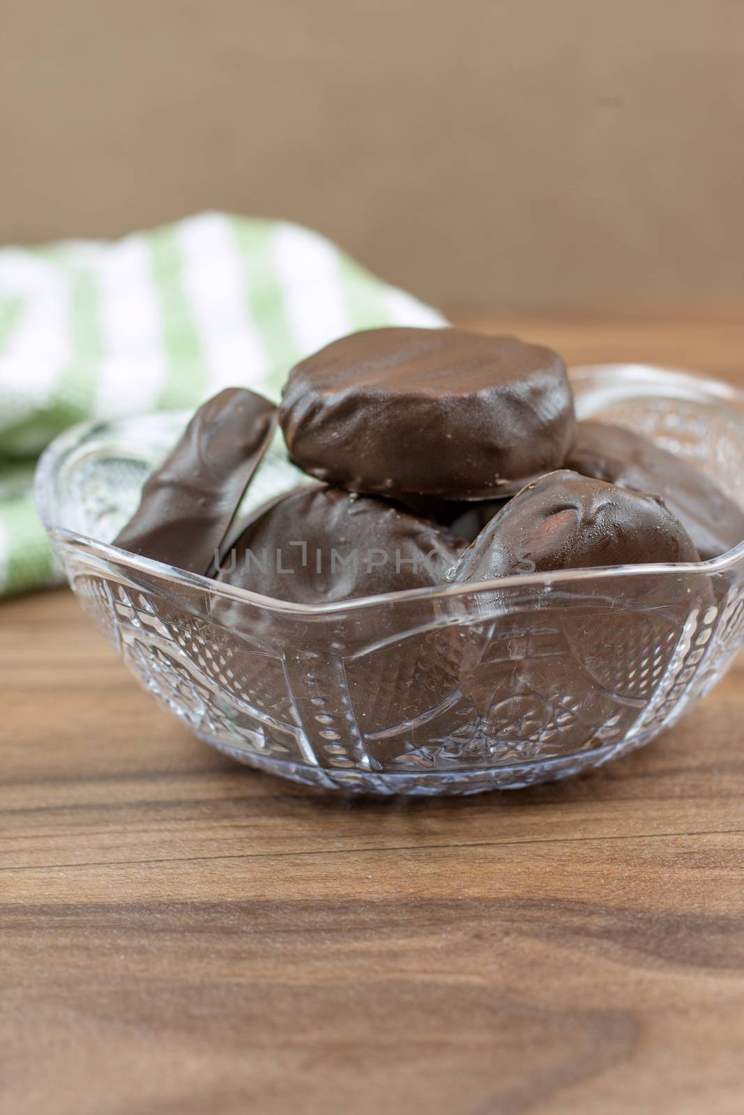 Peppermint patties filled with white, yellow, and orange colored filling.