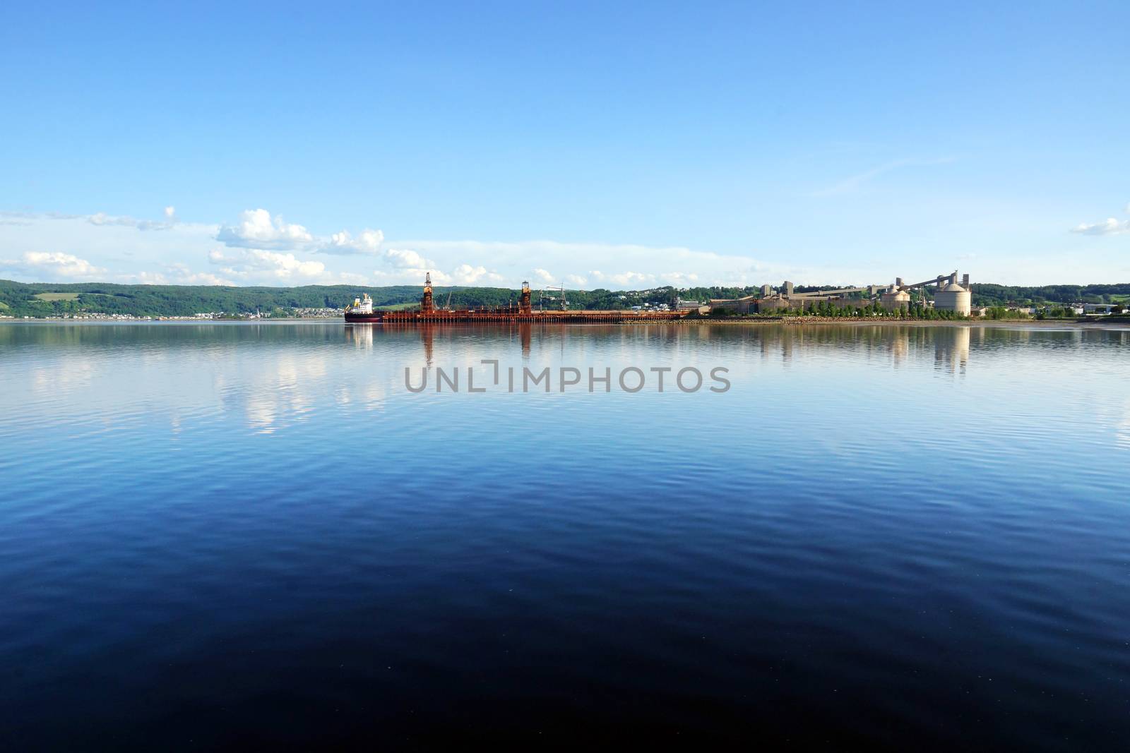 Industrial port in deep water fjord bay