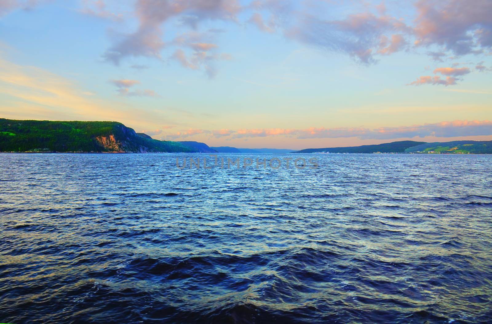 Sunset on a beautiful fjord's bay, LaBaie, Quebec, Canada