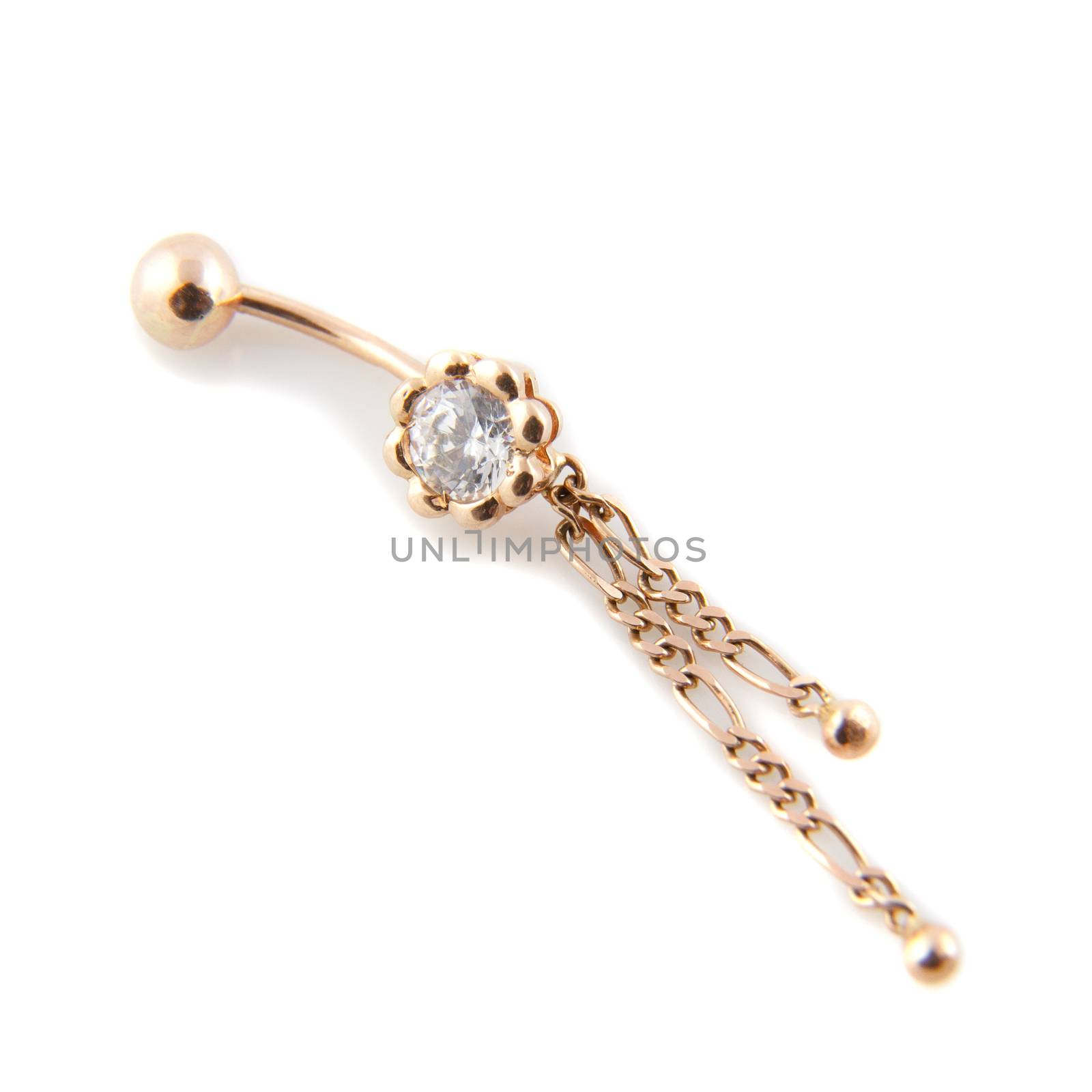 A golden piercing with a beautiful gem stone