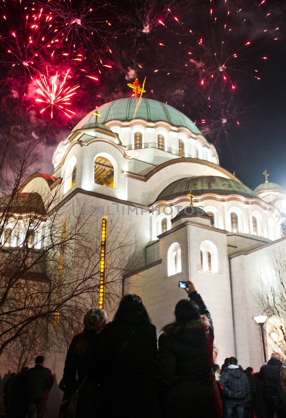 BELGRADE - JANUARY 13: Serbian New years eve celebration in front of the St. Sava's temple with fireworks at midnight in Belgrade, Serbia on January 13, 2013