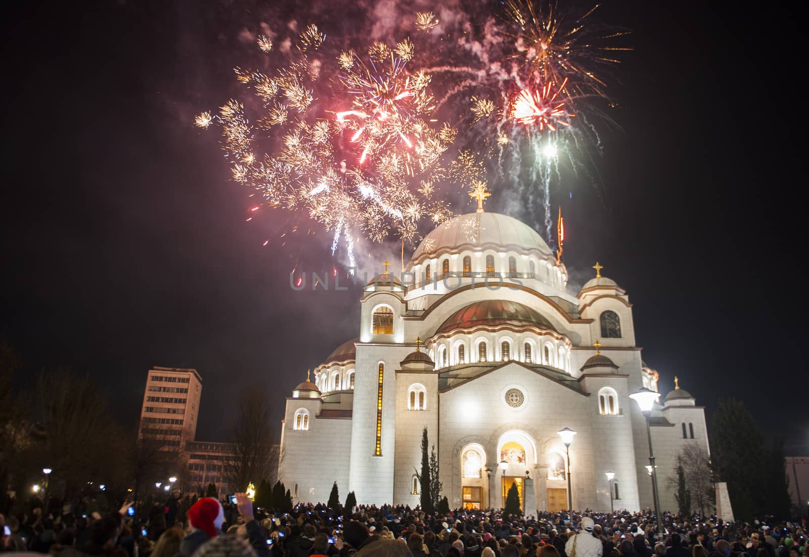 BELGRADE - JANUARY 13: Serbian New years eve celebration in front of the St. Sava's temple with fireworks at midnight in Belgrade, Serbia on January 13, 2014