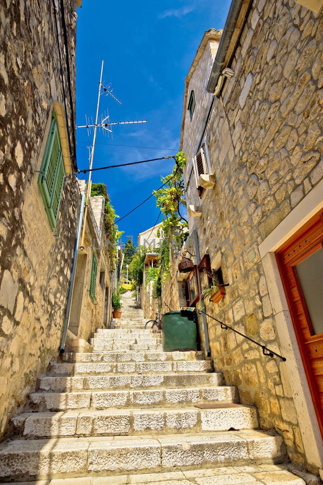 Hvar island old stone street vertical view in Dalmatia, Croatia