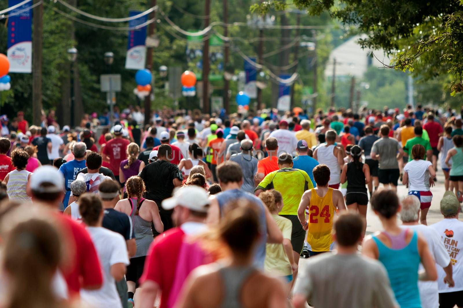 Thousands Run Toward Finish Line Of Atlanta Peachtree Road Race by BluIz60