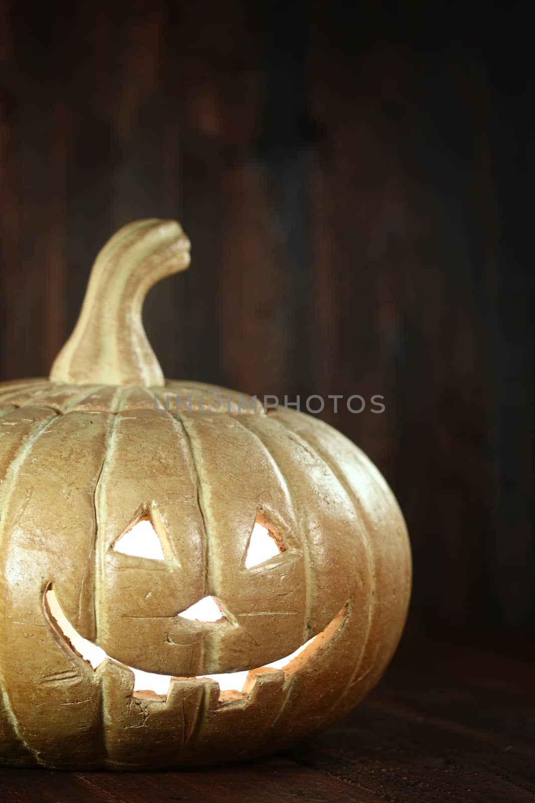 Pumpkin Jack O Lantern on Wood Grunge Rustick Background