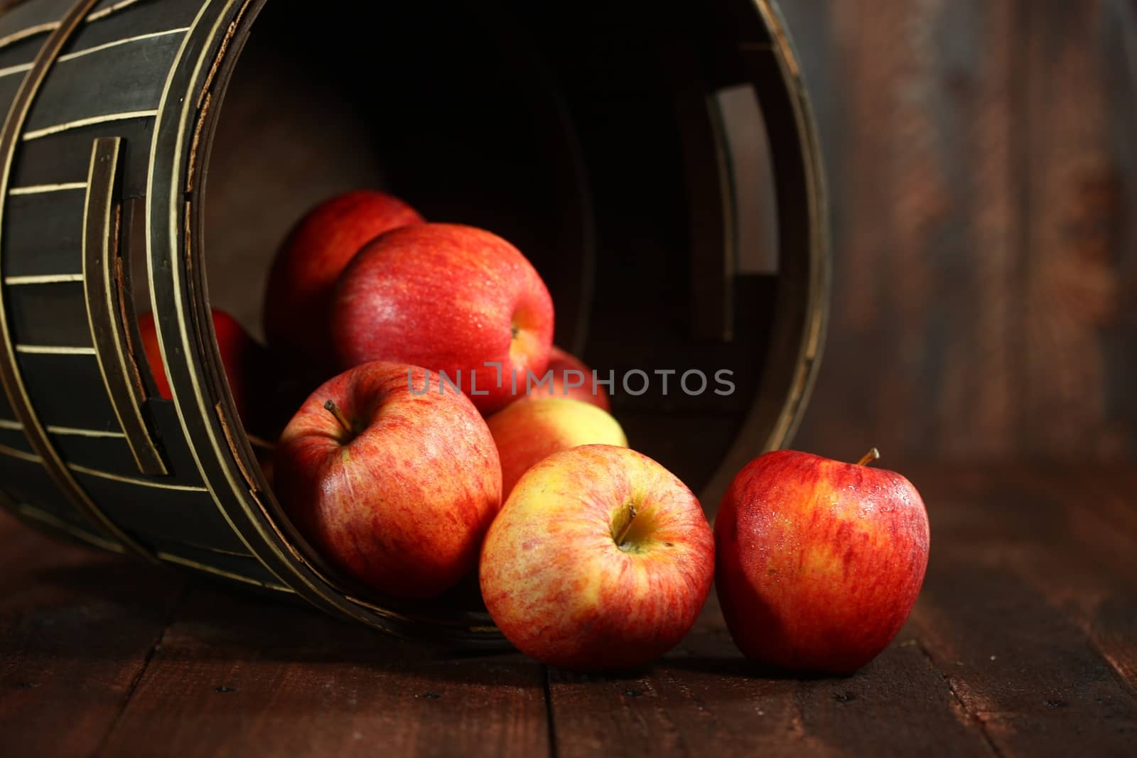 Red Apples on Wood Grunge Background by tobkatrina