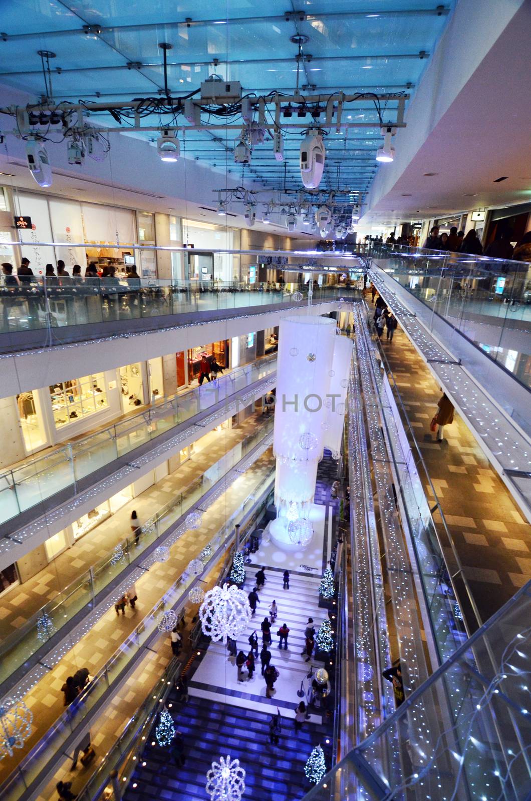 Tokyo, Japan - November 24, 2013: People shopping in Omotesando street by siraanamwong