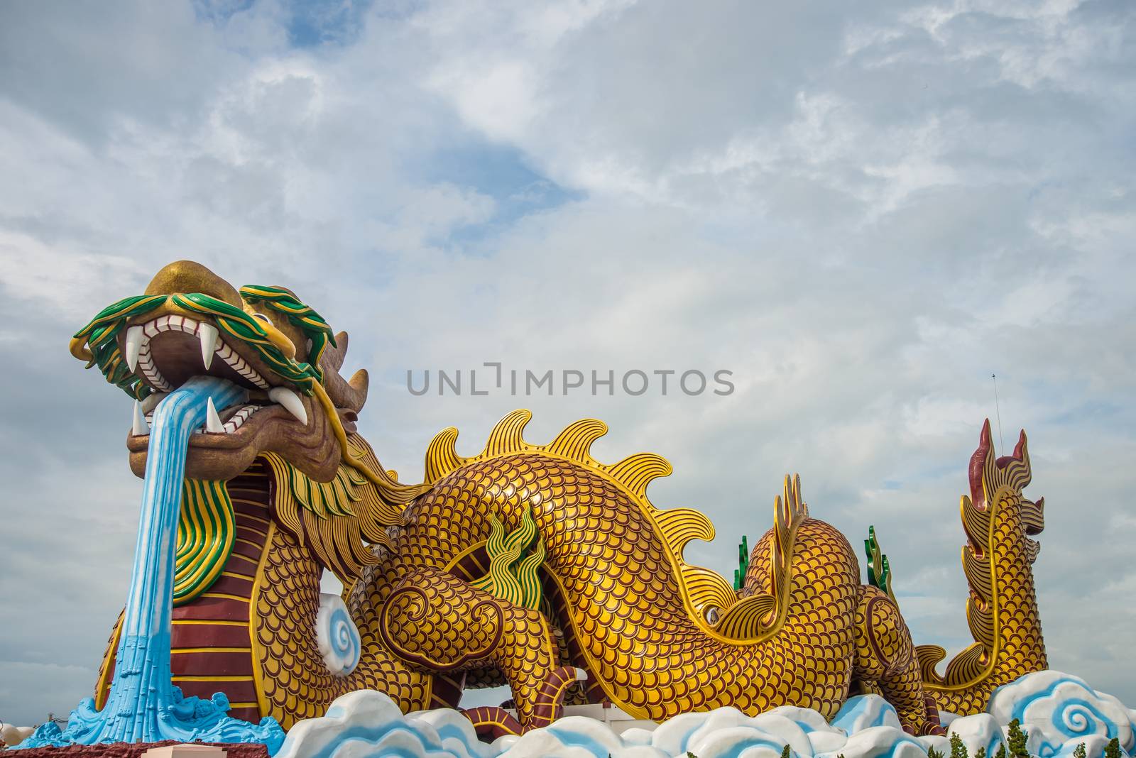 A large dragon statue in the China temple in Thailand.