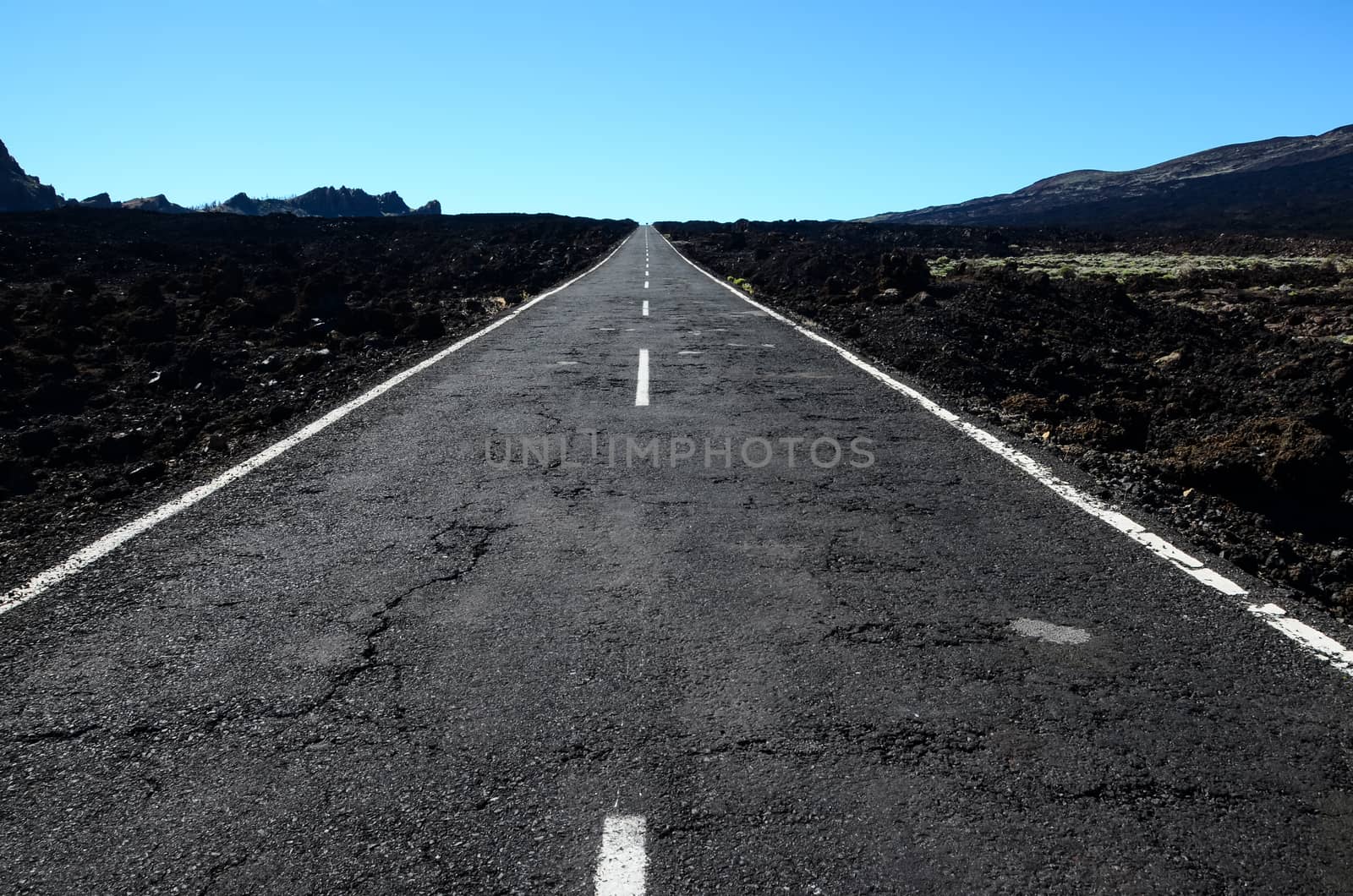 Long Empty Desert Asphalt Road in Canary Islands Spain