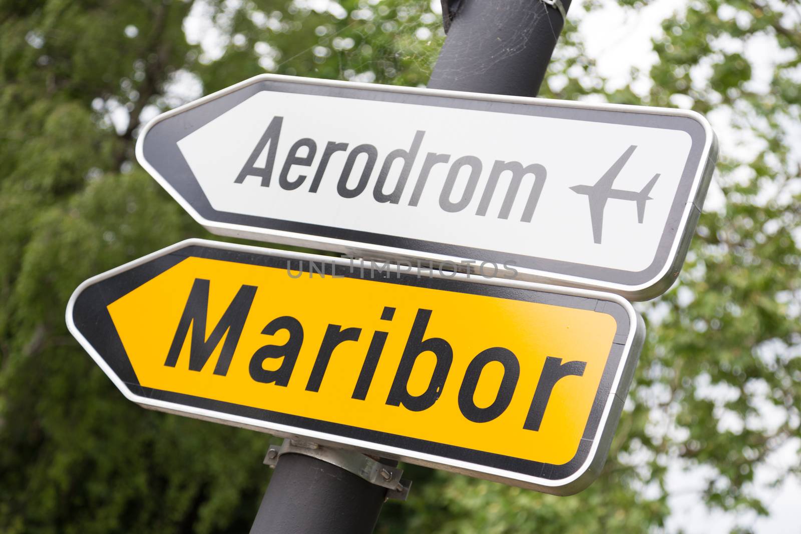 Road sign directing to Maribor and aerport.