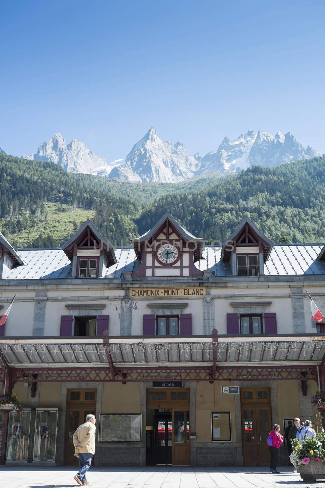 CHAMONIX, FRANCE - SEPTEMBER 02: Facade of Chamonix train station, with Mont Blanc in the background. The city is one of the stages in the popular Mont Blanc tour. September 02, 2014 in Chamonix.
