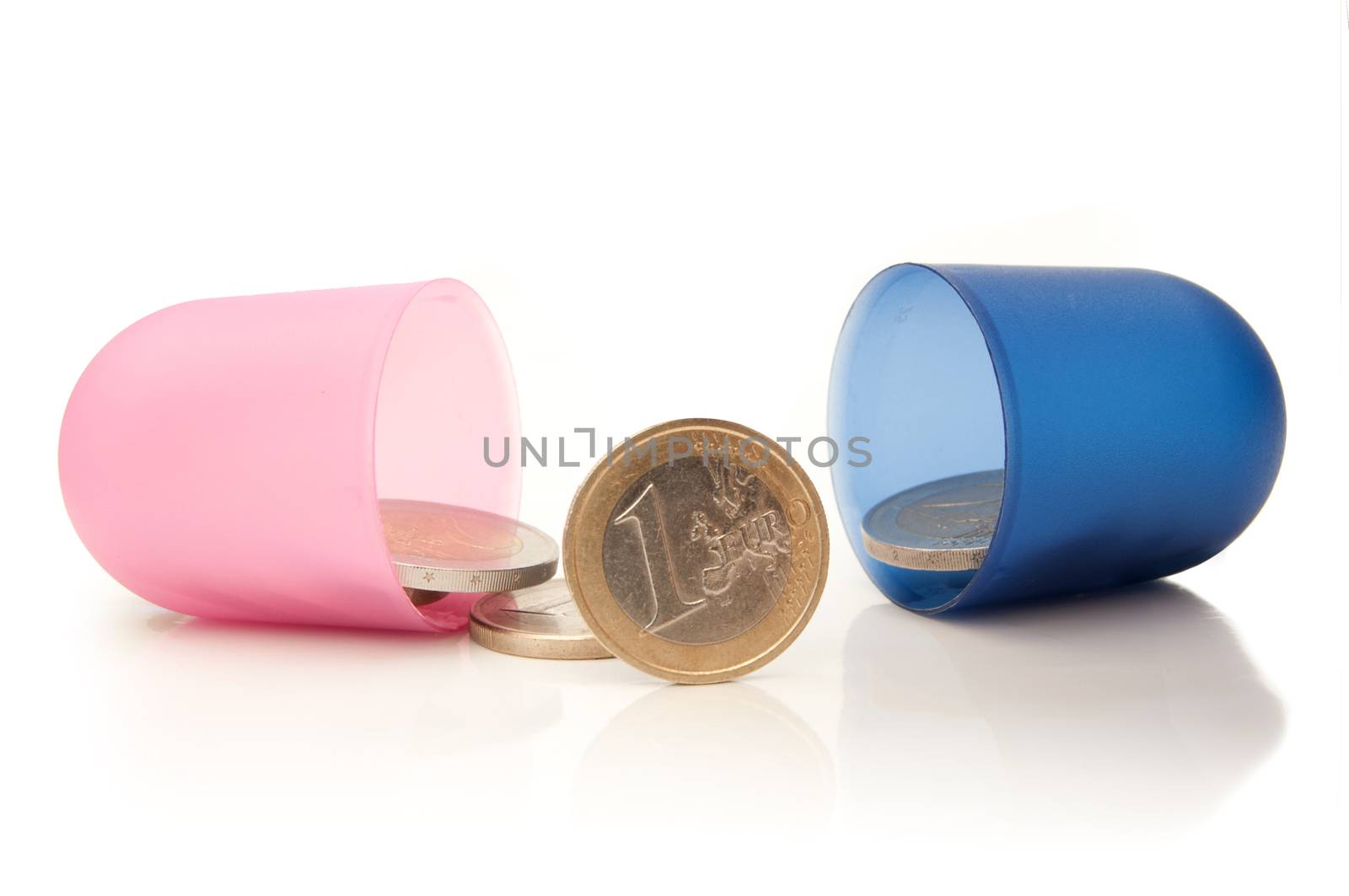 Open medicine pill with euro coins inside 